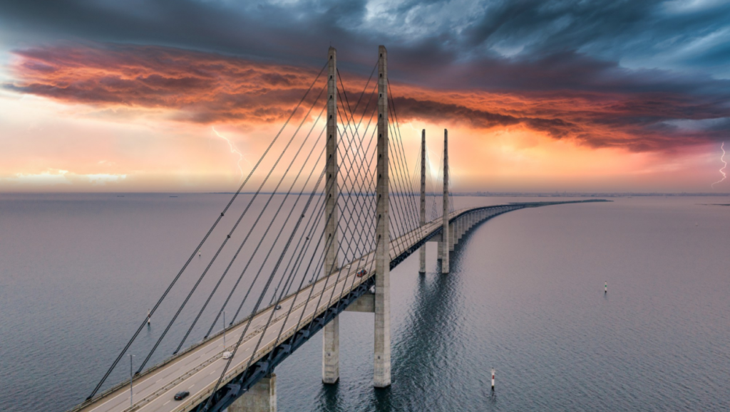 Mesmerizing Aerial View Bridge Denmark Sweden Cloudy Sky 1