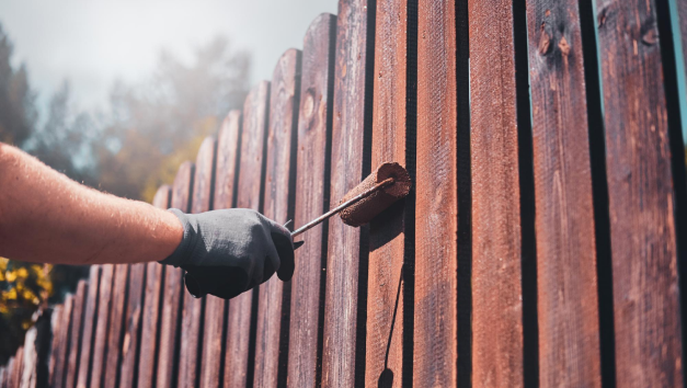 Process Fence Renovation Bright Sunny Day By Man Protective Gloves 1